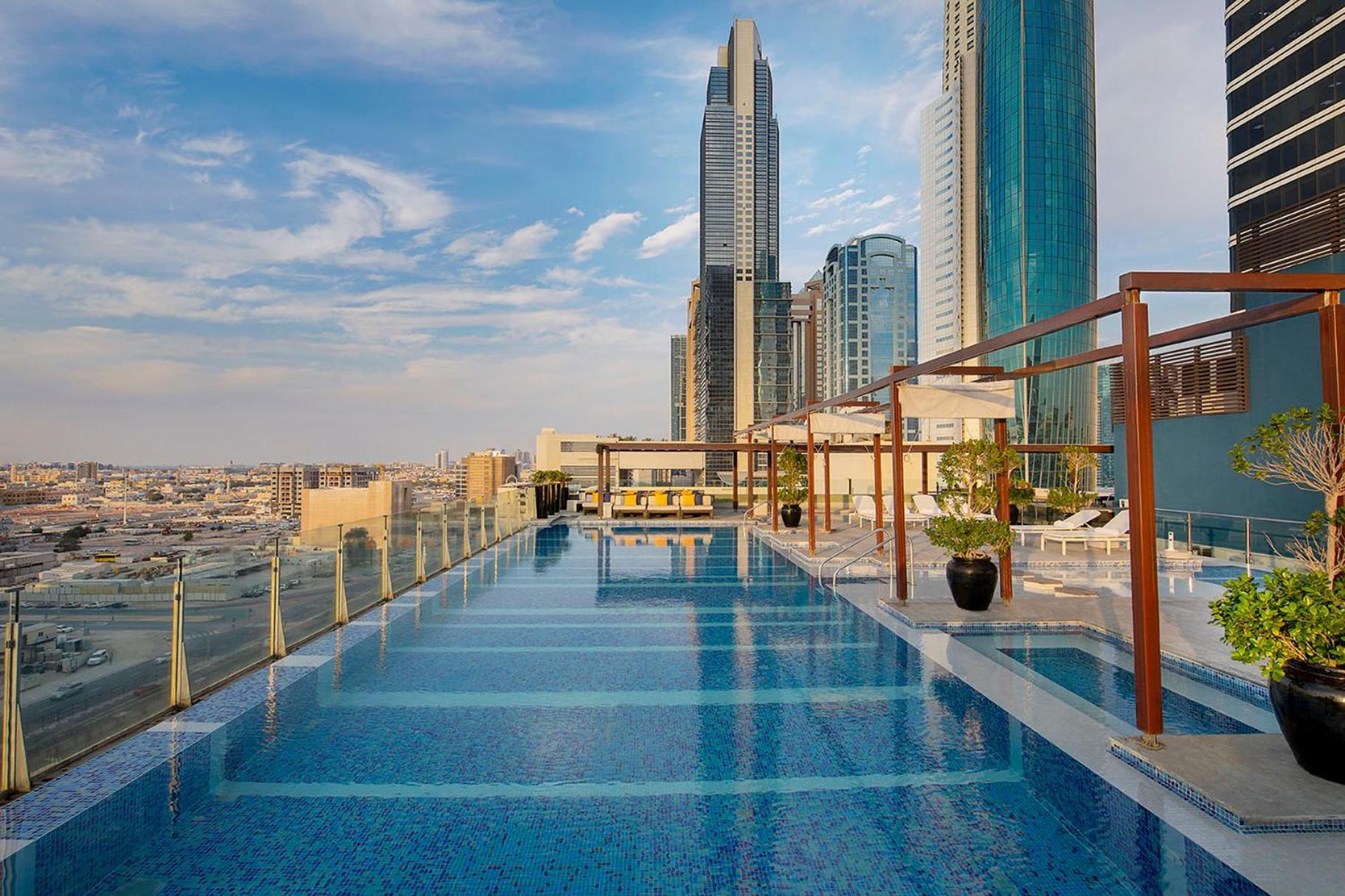 Voco Dubai By Ihg Hotel Exterior photo Rooftop pool at the hotel